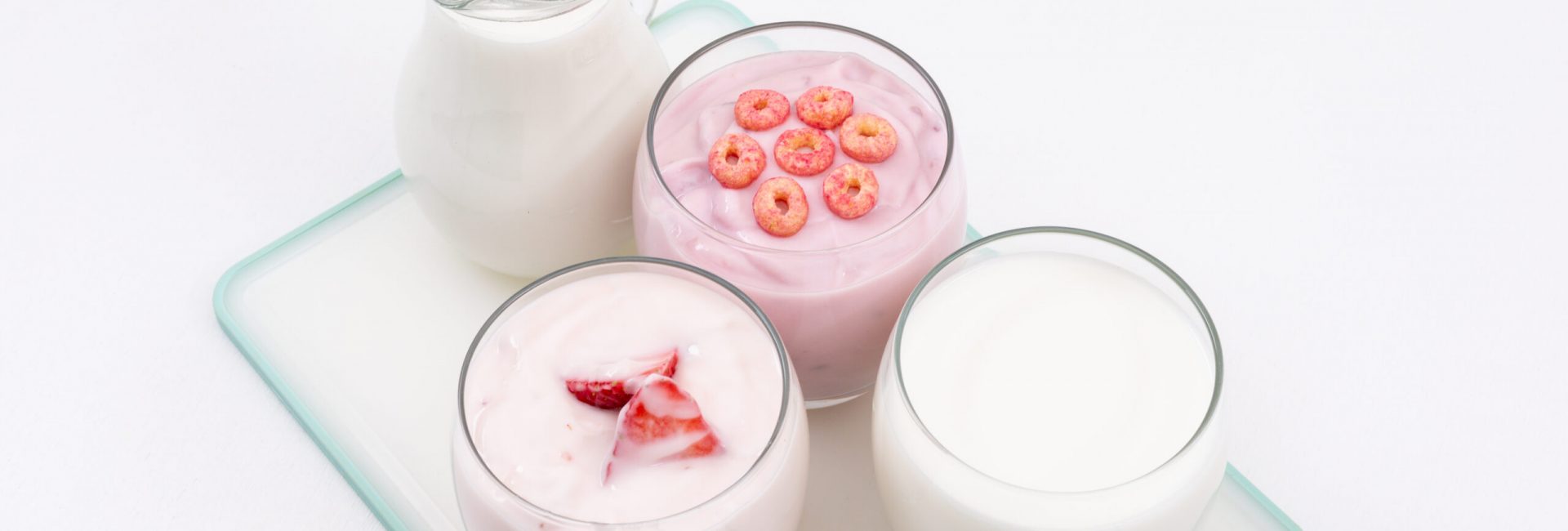 side-view-yogurt-milk-white-surface-horizontal